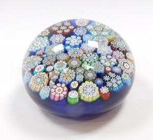 A Peter McDougall millefiori glass paperweight, blue ground with PMCD cane and paper label, 6cm diameter. - 3
