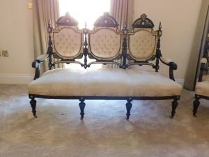 A fine early 20thC French ebonised salon suite, Inc. two & three seater open arm sofas, pair of tripod candle stands/wine tables, narrow display cabinet, 133cm high, 48cm wide, 29cm deep, two plus three open armchairs, oval coffee table, 48cm high, 107cm - 2