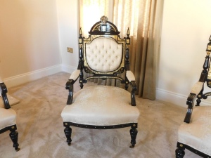 A fine early 20thC French ebonised salon suite, Inc. two & three seater open arm sofas, pair of tripod candle stands/wine tables, narrow display cabinet, 133cm high, 48cm wide, 29cm deep, two plus three open armchairs, oval coffee table, 48cm high, 107cm - 4
