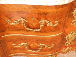 A 20thC kingwood parquetry commode, with marble top, gilt brass adornments to the two drawer front apron and legs, 89cm high, 125cm wide 50cm deep. Provenance: Upon instructions from the executors of Mrs Sandra Mapletoft (Dec'd) who purchased this as Lot - 3