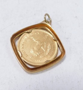 A 1/10th oz Krugerrand pendant, in 9ct box frame, 4.6g all in, 2cm high. - 2