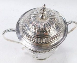 A George V Britannia silver copy of a seventeenth century porringer, of twin handled, covered form, with fluted and engraved decoration, oval vacant reserve, engraved No 131, Harry Freeman, London 1913, 12&frac12;oz, 17cm high. - 4
