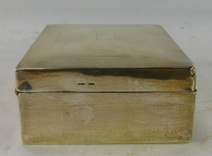 A George V silver cigarette box, with engine turned decoration and vacant shield, Birmingham 1932, 7&frac12;oz gross. - 2