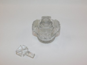 A 19thC cut glass open work crown form scent bottle and stopper. - 2