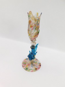 A Venetian dolphin stem vase, possibly Salviati & Company, the shaped scallop shell bowl decorated in colour splashes, white streaks and gold aventurine, raised on a blue dolphin stem and conical folded foot, 22cm high. - 2