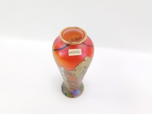 An Okra limited edition glass vase, designed by Dave Barras, of baluster form, decorated with trees, having gilt foliage and white blossom, against a red ground, etched marks, 21cm high. - 2