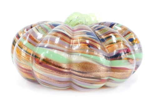 A Murano style glass model of a pumpkin, of fluted form, with spiral twist branch handle, having banded and gold aventurine decoration, 21cm diameter.