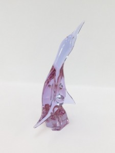 A Murano amethyst glass figure of a Cormorant, modelled perched on a rock, bears indistinct signature, 38.5cm high. - 3