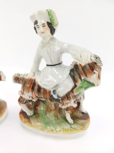 A pair of Staffordshire mid 19thC pottery figures, modelled as the Prince of Wales and Princess Royal, mounted riding on goats, raised on a naturalistic oval base, 19cm high. - 3