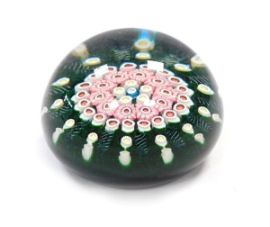 A William Manson Phoenix paperweight, limited edition 10/75, millefiori against a green ground, central PP cane, etched marks, dated 2002, 6cm diameter.