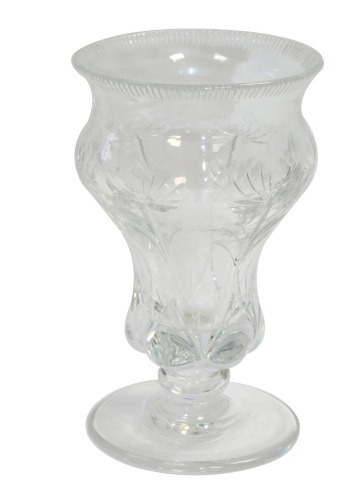 A late 19thC Stevens and Williams glass vase, designed by Frederick Carder, of lobed, inverted baluster form, engraved with flowers emanating from bulbs, raised on a single knobbed stem, 11.5cm high.