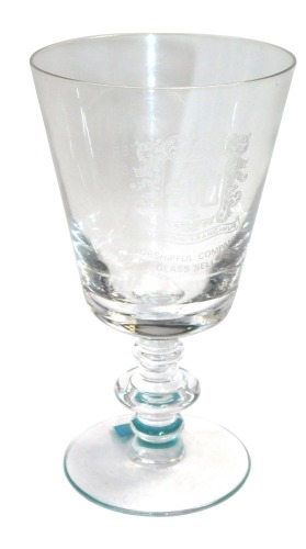A Worshipful Company of Glass Sellers glass goblet, engraved by T & W Ide Limited, Casper Division, London, observe the arms and motto of the company, reverse "Philip Feather, Master 1979-80" within a surround of feathers, bears label to foot, 15cm high.