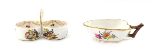 A early 20thC Berlin porcelain leaf shaped salt, painted with floral sprays, blue painted mark, 10.5cm wide, and a Meissen twin division salt, outside decorated with birds, 9.5cm wide. (2,AF)