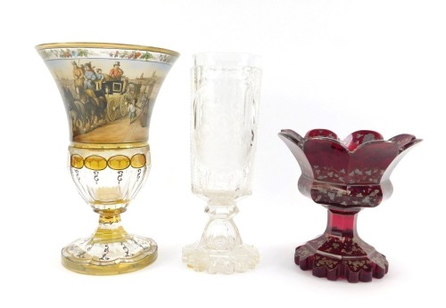 A 19thC Bohemian cut glass vase, with an oblong reserve engraved with battling knights on horseback, raised on an octagonal knop and conical outswept foot, 22cm high, together with a 19thC Continental clear and amber flashed cut glass vase, with a trumpet