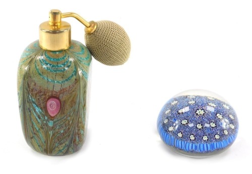 A Murano cut glass atomiser, by Paolotti, with feathered decoration, bears label, 12cm high, together with ALT blue and white type Millefiori paperweight, bears label, 7cm wide. (2)