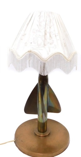 A maritime interest brass table lamp, formed from a Thomas Walker Cherub ship's rotor, raised on a circular base, with shade, 51cm high. Buyer Note: WARNING! This lot contains untested or unsafe electrical items. It is supplied for scrap or reconditioning