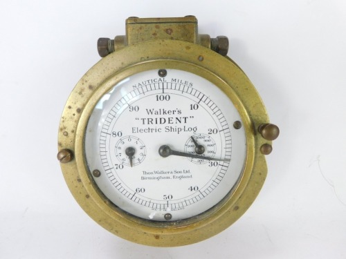 An early 20thC Walker's "Trident" electric ship's log, brass cased, circular white dial bearing nautical miles and two subsidiary dials, serial no. V5500, 19cm wide.