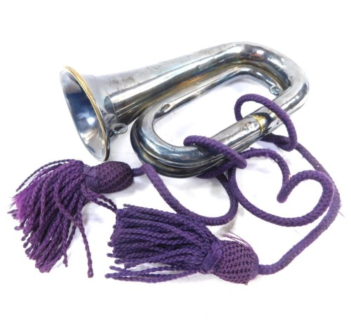 A Hawkes & Son silver plated bugle, lacking mouthpiece, 26cm wide.