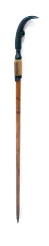 An early 20thC Alpine mountain climbing stick, with goat's horn and foot handle, painted to the shaft with 'Marecottes', 95cm wide,