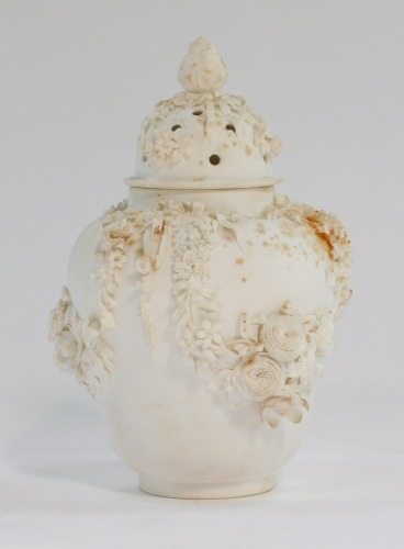 A Crown Derby style bisque porcelain pot pourri vase and cover, the top with acorn finial, with applied floral decoration, 22cm high. (AF)