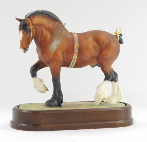 A Royal Worcester shire stallion figure, dated 1964, on a wooden plinth, 24cm high.