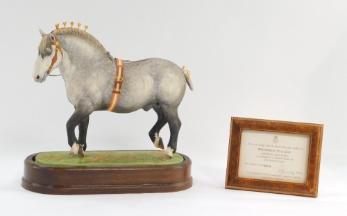 A Royal Worcester Percheron stallion figure, model no 303, on wooden base, with presentation plaque, 25cm high.