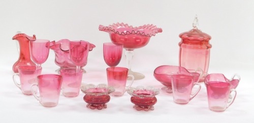 A group of Victorian and later cranberry glass, to include a stem bowl, jar and cover, coffee cups, wine glasses, etc. (a quantity)