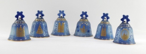 A set of six Royal Copenhagen collector's bells, comprising Notre Dame Paris 1978, Ring Out The Bells 1977, Cologne Cathedral 1980, Old North Church Boston 1976, 1974 and 1979, each 13cm high. (6)