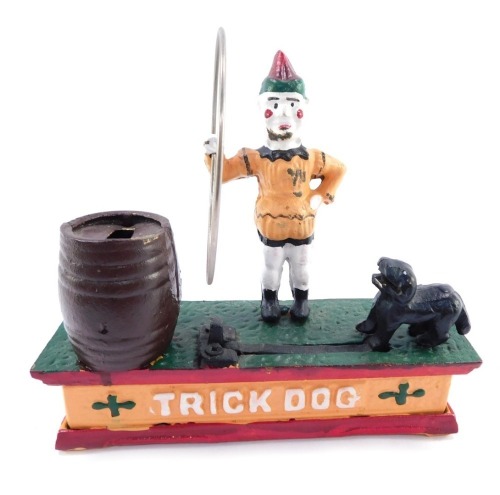 A reproduction Trick Dog cast iron money box, 19cm high.
