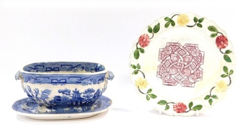 A group of ceramics, comprising a Goodwins and Harris 19thC childs plate, 18cm diameter, a blue and white tureen and plate. (3, AF)