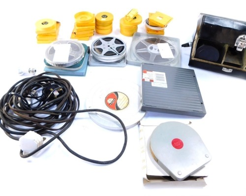 A Canon Cine Zoom 512 camera and various reels. Buyer Note: WARNING! This lot contains untested or unsafe electrical items. It is supplied for scrap or reconditioning only. TRADE ONLY