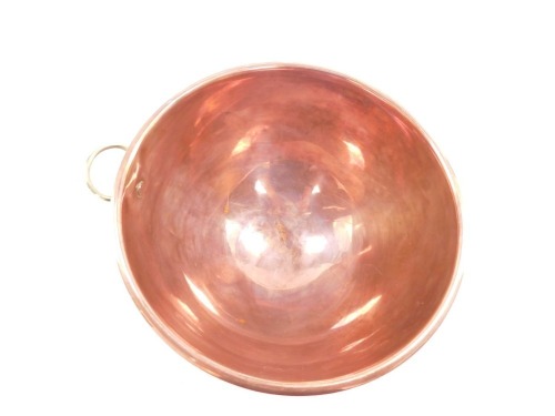 A vintage copper pan cover, 20cm diameter.