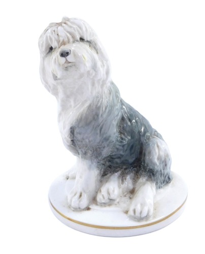 A Royal Worcester Old English puppy figure, modelled by Kenneth Potts, printed marks, 13cm high.
