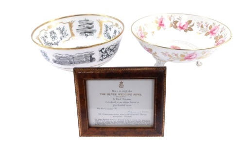 Two Coalport commemorative bowls, comprising The Commemorative Silver Jubilee of Queen Elizabeth II limited edition rose bowl, 141/500, 27cm high, and the Silver Wedding bowl by Royal Worcester, limited edition No 14, 26cm diameter, with plaque. (2)
