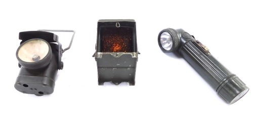 A WWII British army Lantern Electric Traffic No 2, WBB190GD, a Lamb's Electric lamp No 1 C.6.C, and a GPG torch. (3)