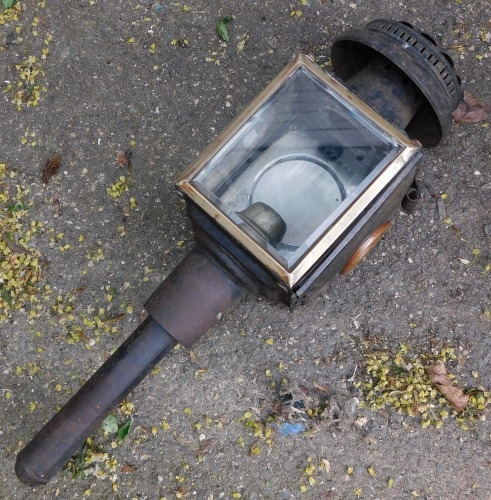 A carriage lantern, black metal casing, with two glazed panel section, unmarked, 46cm high.