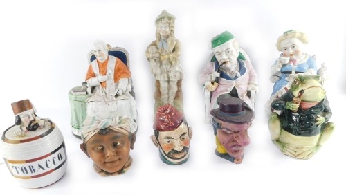 A group of novelty tobacco jars, to include a frog, seated man with a pip, seated Papal figure, etc. (a quantity)