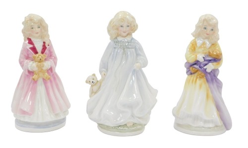 Three Royal Doulton NSPCC Centenary figures, comprising Hope HN3061, limited edition 2339/9500, 22cm high, Faith HN3082, limited edition 6033/9500, 21cm high, and Charity HN3087, limited edition 1942/9500, 21cm high. (3)