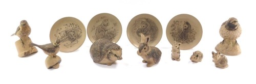 A group of Poole Pottery figures, comprising three mice, rabbit, three birds, hedgehog and four collector's plates.