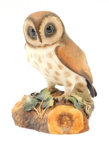 A Royal Crown Derby brown owl, matt, 15cm high, boxed.