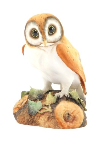 A Royal Crown Derby matt owl, 15cm high, boxed.
