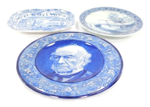 A group of blue and white plates, comprising a Copeland Spoke meat plate 31cm wide, a Delft Royal Sphinx cabinet plate depicting a bridge, 30cm wide, and a Middleport Pottery blue and white charger, 36cm wide