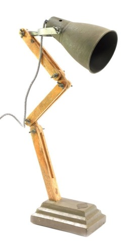A Tee Noble Lighting Company desk lamp, 55cm high when fully extended. WARNING! This lot contains untested or unsafe electrical items. It is supplied for scrap or re-conditioning only TRADE ONLY