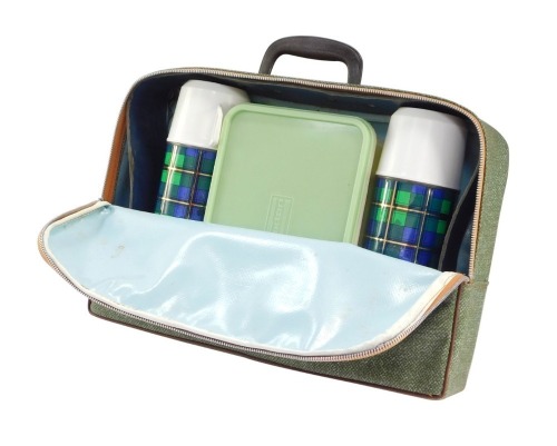 A Brexton lunch box case, the material outer casing with two plastic flasks and sandwich box, 38cm wide, 28cm high, 8cm deep.