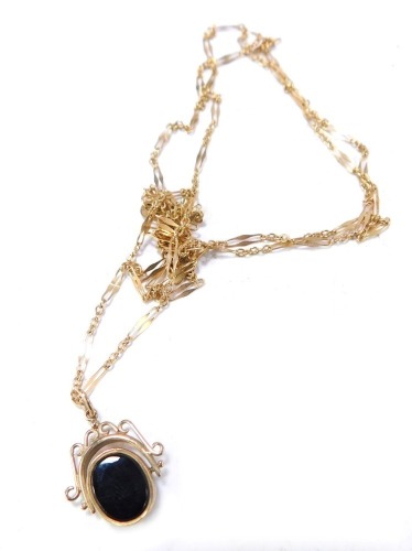 A 9ct gold swivel agate pendant, set with green and red agate, 12cm high, on a fancy link neck chain, 72cm long, 5.2g all in.