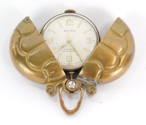 An Estyma trench art pocket watch in brass beetle case, with five jewel anti-magnetic movement, stamped Germany to clasp.