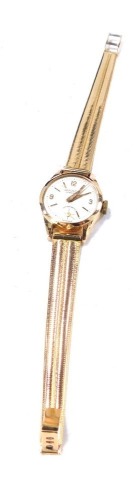 A Mados 18ct gold lady's wristwatch, with silvered watch head and seconds dial, 2cm wide, on two row briquette effect bracelet, 26.9g all in, 18cm long. (boxed)