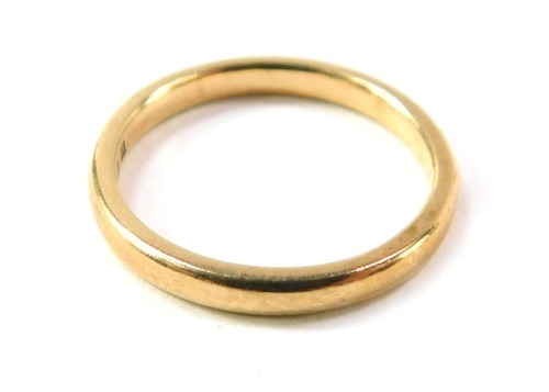 A 9ct gold wedding band, of thin design, size J&frac12;, 1.9g.