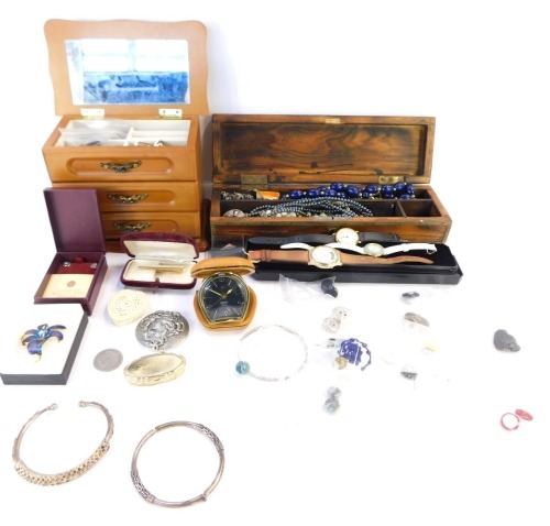 A group of costume jewellery and effects, comprising three Eastern bangles, white metal unmarked, travel clock, drop earrings, jewellery box, etc. (a quantity)