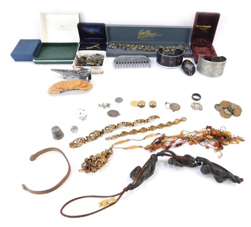 A group of costume jewellery, comprising Eastern bangle, collar studs, imp neck chain, floral brooches, tie clips, etc. (a quantity)